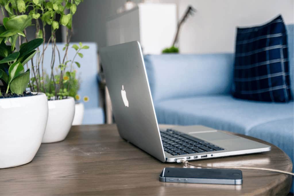 laptop sitting on a table in a living room