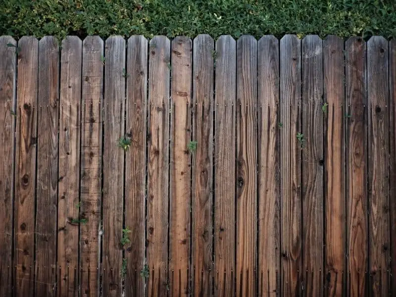 a brown wooden fence