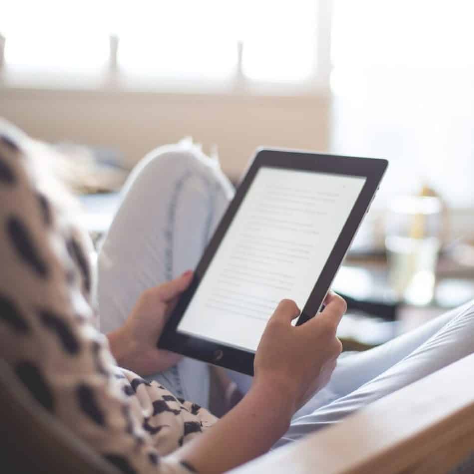 a woman holding a kindle