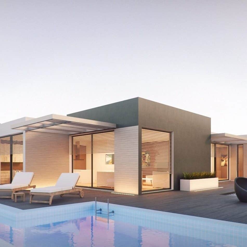 a modern style house with a pool in the front